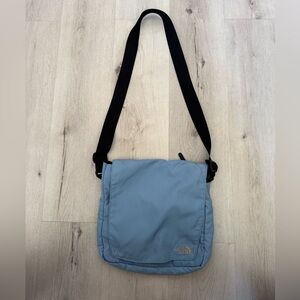 The North Face Light Blue Men’s Crossbody Messenger Bag with Black Strap
